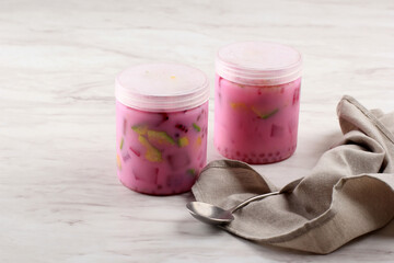 Es Buah (Fruit Coctail) on a Jar, Ready to Eat Dessert for Food and Beverage Ramdhan Bussiness Concept, Copy Space for Text