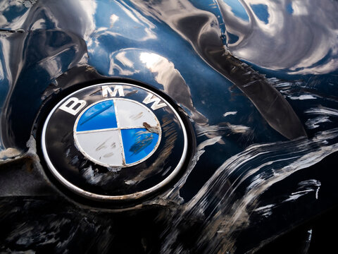 Macro Shot of a Bmw Badge after the road accident