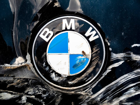 Macro Shot of a Bmw Motor Company Badge after the road accident