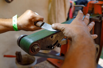 close up of hands working in workshop