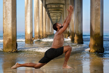 Yoga Male Afro-American Instructor in Crescent Lunge