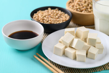 Sliced tofu, soybean seeds, soy milk and soy sauce, Healthy vegan food