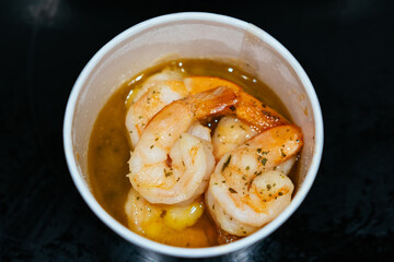 Obraz na płótnie Canvas Shrimp dinner with butter seasoning oil