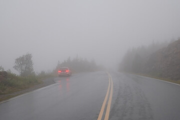 Foggy morning on the road  up to Cadillac Mountain on the Maine coast in Acadia National Park