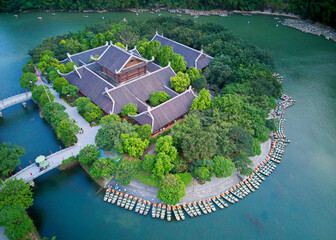 Naklejka premium NINH BINH, VIETNAM - APRIL 21, 2021: Aerial view of the main Pagoda in the center of Trang An - Bai Dinh Spiritual and Cultural Complex