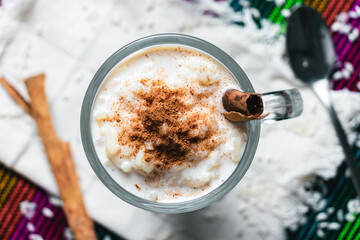 Rice pudding and cinnamon, Mexican dessert, different backgrounds, frontal and overhead