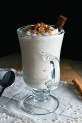 Rice pudding and cinnamon, Mexican dessert, different backgrounds, frontal and overhead	