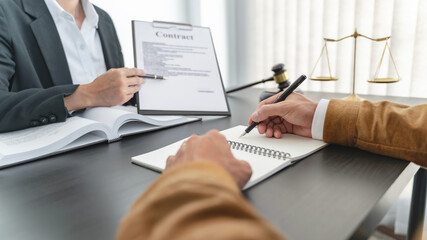 Lawyer discuss the contract and legal document agreement in office. Law and legal concept
