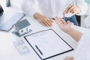 home loan insurance. .Real estate broker and client  sign contract insurance agreement document. Business meeting concept