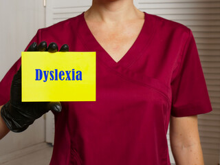 Healthcare concept meaning Dyslexia with inscription on the sheet.