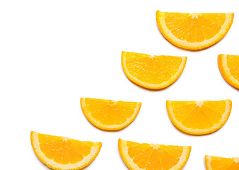 Slices of fresh oranges on white background