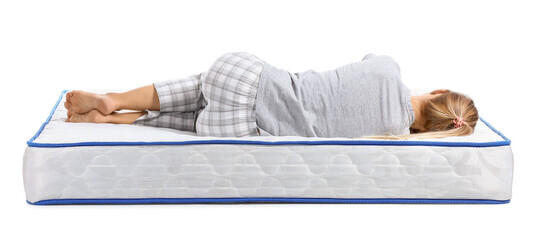 Mature woman sleeping on soft mattress against white background