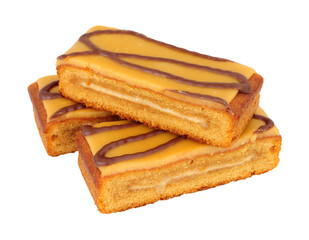 Caramel flavour sponge cake slices topped with salted caramel icing isolated on a white background