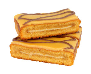 Caramel flavour sponge cake slices topped with salted caramel icing isolated on a white background