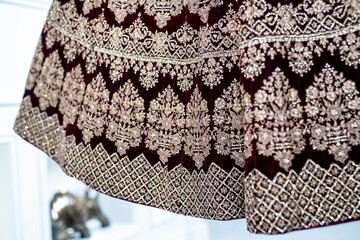 Indian Punjabi bride's wedding outfit pattern, fabric close up