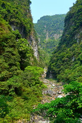 Fototapeta na wymiar Shakadang Trail, a path carved into the wall of a marble cliff in Taroko National Park, Hualien, Taiwan
