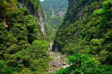 Fototapeta na wymiar Shakadang Trail, a path carved into the wall of a marble cliff in Taroko National Park, Hualien, Taiwan