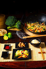 Fried vegetables from the wok with deep fried meat