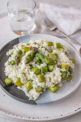 Spring food; Delicious risotto with asparagus and wild garlic