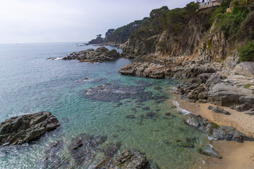 Fototapeta na wymiar Landscape of cliffs and crystal clear waters in COSTA BRAVA