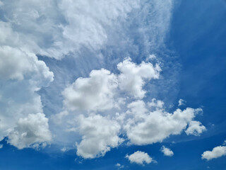 Blue sky background with big clouds