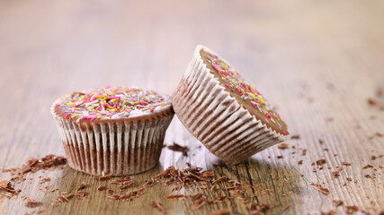chocolate cupcake on wood background