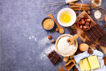 Fototapeta na wymiar baking background- chocolate with flour, egg and spices