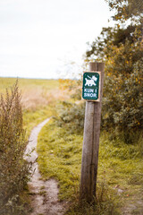Park only for dogs. Sign that the dog must be on a rope.