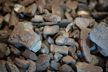 black coal pieces. Close-up. Background. Texture.