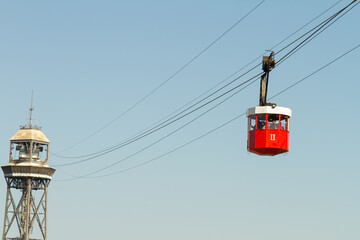 Montjuic cable car, red colored cabin in Barcelona, tourism concept