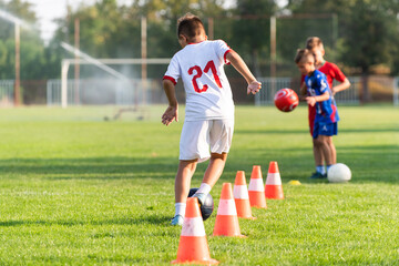 Boy Soccer Player In Training.