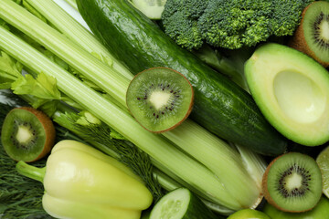 Fresh green vegetables on whole background, close up
