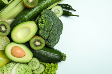 Fresh green vegetables on white background, space for text