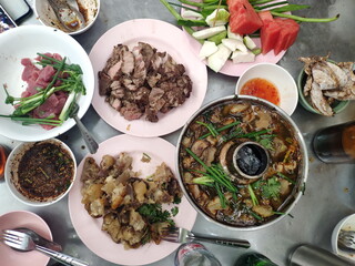 Top View of The Real Esan Food. Raw Beef and Soup from North Eastern of Thailand. The very original Shot.