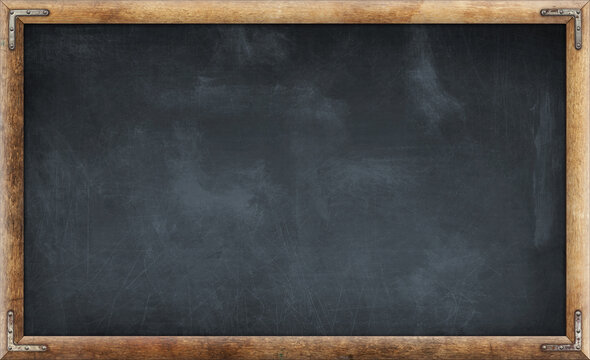 Old dirty blank blackboard in wooden frame