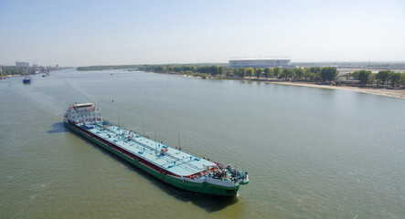 Fototapeta na wymiar Passage of tankers with oil products along the Don River through Rostov-on-Don, Russia