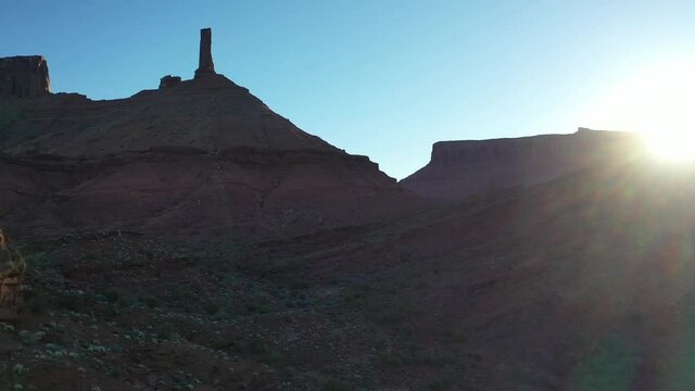 Castleton Rock formation in Utah near Moab. Aerial 4K drone video with lens flare.