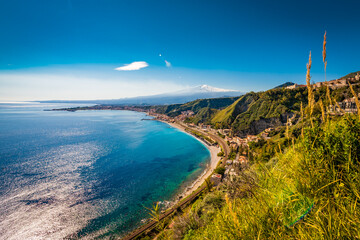 Natural scenery of mount Etna and the coastline in Taormina, Sicily