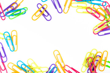colored paper clips isolated  - IMAGE