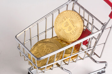 Bitcoin in shopping cart. stock photo