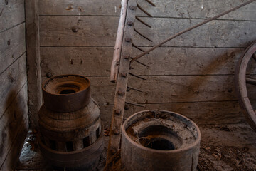 Old  vintage rake against wooden wall