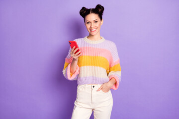 Photo of happy good mood lovely pretty girl blogger influencer addicted to smartphone isolated on violet color background