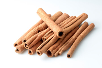 Cinnamon sticks isolated on white. stock photo