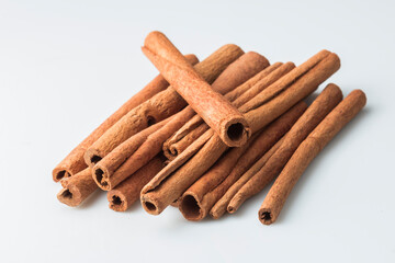 Cinnamon sticks isolated on white. stock photo