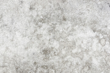 Stained concrete background. Water stains grunge wall. Gray cement texture. Grunge outdoor ground pavement pattern. Dirty cement block outside structure.