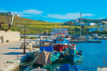 Greece Santorini island in Cyclades, Ammoudi village with fishing boats