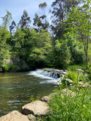 A beautiful little waterfall cascade in the Neiva River in Antas, Esposende, Portugal.