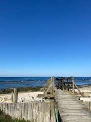 Wooden bridge to the beach at the Northern Litoral Natural Park in Esposende, Portugal.
