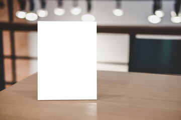 Mock up acrylic frame posters pattern template forms background, blank menu frame on table in coffee shop or restaurant stand for your text of display your product