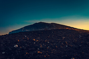 The top craters (crateri Sommitali) of Mt Etna by twilight. 